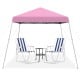 Outdoor instant pop-up canopy in pink with two striped chairs and a table, perfect for camping and gatherings.