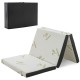 Tri-fold memory foam mattress topper with bamboo cover and carrying bag, ideal for portable sleeping and lounging.