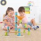 Children playing with the Bamboo Build Run Toy marble set, featuring colorful bamboo pieces for creative engineering.