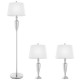 Sleek silver table lamp from a 3-piece set, designed with a linen shade for soft lighting in any room.