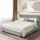Upholstered full/queen bed frame in silver with tufted headboard and 4 drawers for stylish storage and comfort.