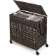 Brown 110L 2-section laundry hamper with removable liner bags, flip-up lid, and wheels for easy mobility and storage.