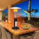 Portable tabletop propane patio heater in black, 11,000 BTU, ideal for outdoor warmth in gardens and patios.