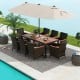 11-piece patio dining set featuring a large acacia wood tabletop, hand-woven PE rattan chairs, and a 15 ft umbrella for.