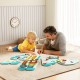 Dinosaur activity wall busy board for toddlers featuring xylophone, clock, and abacus, promoting learning through play.