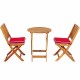 Folding wooden bistro set featuring two cushioned red chairs and a round table, perfect for outdoor dining.
