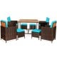 9-piece patio rattan dining set with turquoise cushions, featuring a sturdy acacia wood tabletop for outdoor use.