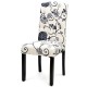 Tufted upholstered dining chair in black and white fabric with solid rubberwood legs, ideal for home or café use.