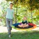 Multicolor 40-inch flying saucer tree swing with a child and adult, perfect for outdoor fun and relaxation.