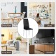 Black PVC leather dining side chair with painted steel legs, showcasing modern elegance for various home settings.