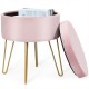 Round pink velvet storage ottoman with metal legs, featuring a soft surface and interior space for organizing.