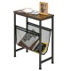 Narrow end table with a sturdy steel frame and mesh magazine holder, ideal for small spaces in bedrooms or offices.