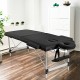 Close-up view of the black portable massage bed's high-density sponge and PVC leather, offering exceptional comfort for.
