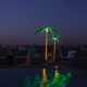 LED pre-lit palm tree decor with warm lights, perfect for indoor or outdoor use, enhancing festive atmospheres.