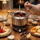 Electric fondue pot with removable stainless steel pot, 2.3 L capacity, and 6 color-coded forks for easy sharing.