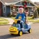 Kids ride-on train in Chuggington blue with adjustable seat, music features, and a smiling child and dog for outdoor.