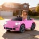 Pink 12V electric ride-on car with remote control, LED headlights, and music, perfect for kids aged 3 and up.