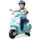 Kids electric VESPA motorcycle in green with comfortable seat and foot pedal for easy acceleration, perfect for young.