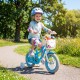 Colorful 12-inch kids bike featuring a removable storage basket and dual brakes, perfect for young riders exploring.