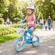Kids bike with removable storage basket, dual brakes, and adjustable seat, perfect for outdoor fun and learning to ride.