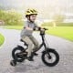 Kids bike with removable training wheels, adjustable seat, and dual brakes, perfect for ages 3-8, shown on a path.