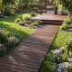 Wooden garden pathway with textured surface, 22 inches wide, perfect for outdoor patios and gardens.
