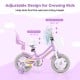 12-inch girls bike in purple with adjustable seat, dual brakes, and doll seat, perfect for children aged 3-4 years.