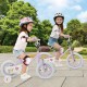 Two kids riding a purple 12-inch bike with training wheels, designed for ages 3-8, showcasing safety features and fun.
