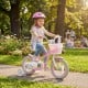12-inch pink kids bike with adjustable seat, basket, and streamers, perfect for girls aged 3-4 years old.