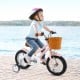 12-inch kids bike in pink with adjustable seat, training wheels, and wicker basket, perfect for ages 3-8 years old.
