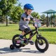 12-inch kids bike with training wheels, black with vibrant monster graphics, perfect for outdoor fun and learning.