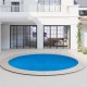 Round 12ft x 30in above ground swimming pool with a protective cover, designed to retain heat and reduce debris.