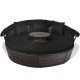 Round outdoor daybed with black cushions and retractable canopy, perfect for patio or poolside relaxation.