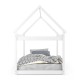 Stable kids platform floor bed with roof in white, featuring sturdy wooden frame and heavy-duty slats for durability.