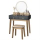 Makeup vanity table set in black with LED mirror, four drawers, and cushioned stool for stylish dressing areas.