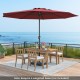 12 ft red patio umbrella with crank handle, supported by 8 sturdy ribs, ideal for outdoor shading on patios or.