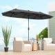 Double-sided 13 feet patio umbrella in gray with crank handle, providing ample shade for outdoor seating areas.