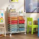 14-drawer rolling storage cart in macaron colors with metal tabletop and pegboard, ideal for organizing various spaces.