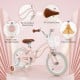14-inch pink kid's bike with removable training wheels, storage basket, and durable carbon steel frame for safe riding.