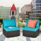 Armless sofa set featuring blue cushions and pillows, made of hand-woven rattan, ideal for patio or garden use.