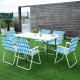 Folding beach chairs in blue webbing with a steel frame, set around a table for outdoor gatherings.