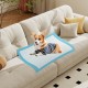 Pet wee pee pad on a couch, made of soft non-woven fabric, ideal for training and protecting floors from pet messes.