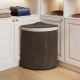 Black bamboo laundry hamper with removable liner, 15-gal capacity, ideal for bedrooms and laundry rooms.