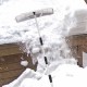 Large poly blade telescoping snow roof rake in use, extending to 21 feet for safe snow removal from rooftops.