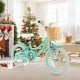 16-inch kids bike in green with training wheels, adjustable seat, and front basket for fun and creativity indoors.
