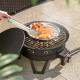 Portable 17-inch gas fire pit with grill, stainless steel burner, and folding legs, ideal for camping and outdoor.