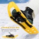 Yellow 17” kids snowshoe featuring a flexible pivot bar and monster grip crampons for stable walking on snow.