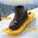 Kids snowshoe with adjustable bindings and trekking poles, designed for stability and comfort in snowy conditions.