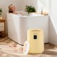Yellow 18L towel warmer with LED display, holding large towels, ideal for cozy warmth and aromatherapy in the bathroom.
