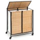 Two-section laundry hamper with lid, bamboo slats, and lockable wheels for easy sorting and mobility.